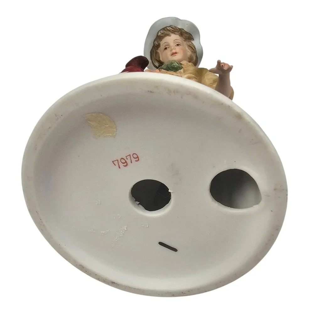 Andrea by Sadek Vintage Porcelain Boy Figurine with‎ Water Jug and Feather Hat